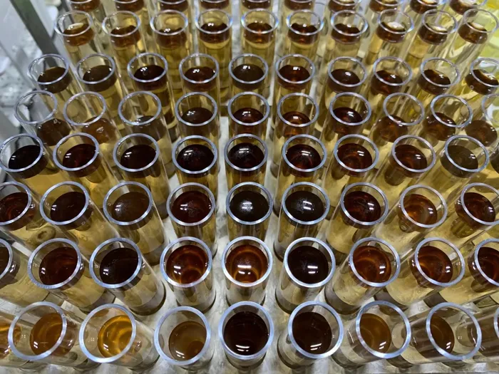 Rows of plant and soil extracts in sample cups in the Next Level Ag lab